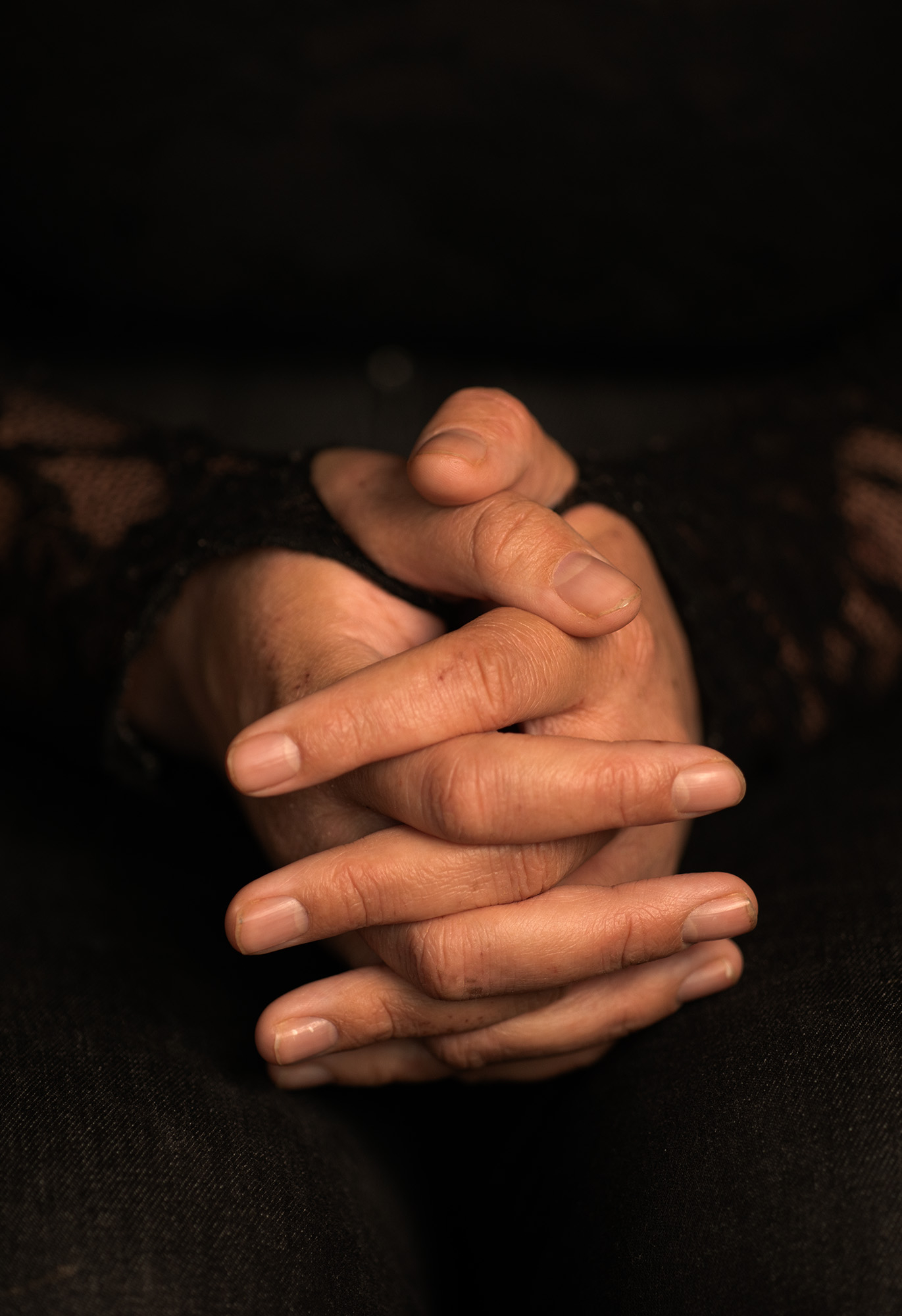 Cherie's hands in prayer